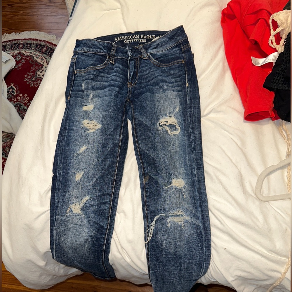 dark wash distressed jeans